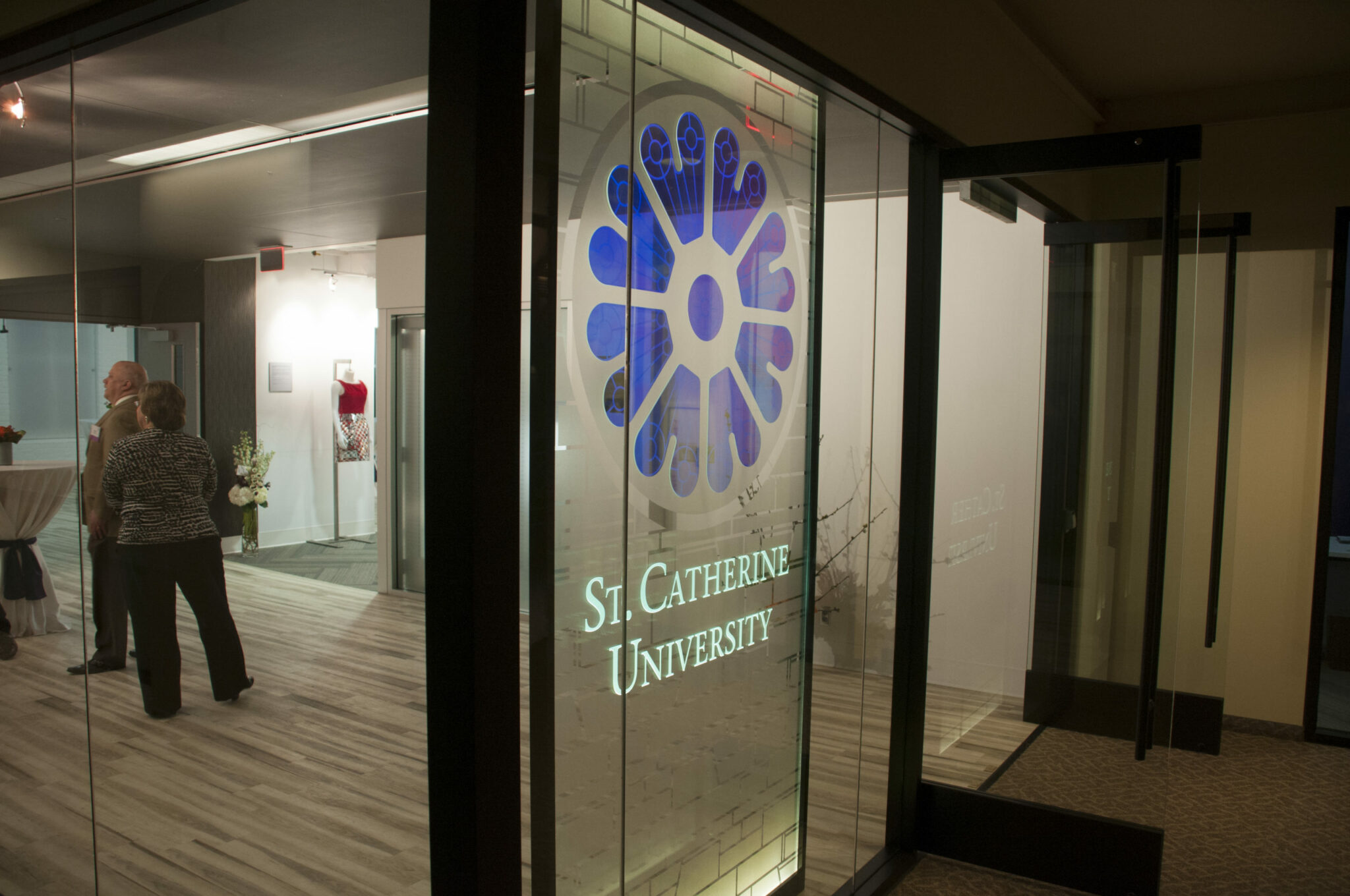 Interior door at St Catherine university with graphics manifested onto it