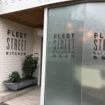 Frontage of Fleet Street Kitchen. Window film is installed displaying brand name and logo.